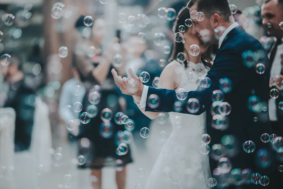 bride and groom first dance with bubbles